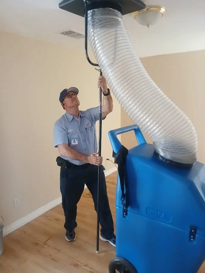 HVAC Installation technician using HEPA equipment in Naranja